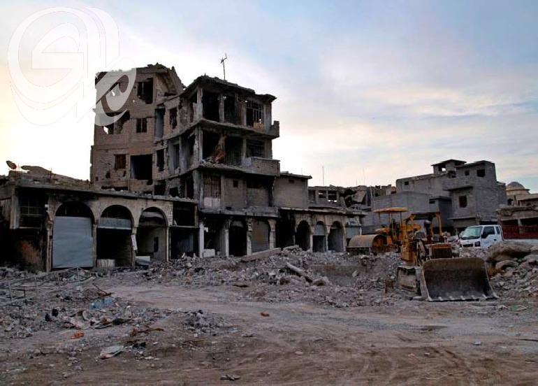 عراقيون يعيدون إعمار الموصل ببطء بمساعدة حكوم