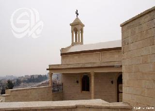 إعادة بناء الكنائس.. رسالة أمل لمسيحيي العراق